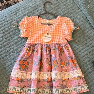 Girls size 4 wildflowers top/dress/tunic. Never worn